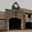 Athelstaneford Mains.
Detail of main entrance in N side of steading, showing clock, 1860 date and bovine sculpture.