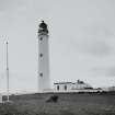 Barns Ness Lighthouse.
View from N of lighthouse, with flagpole in foreground.