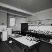 Interior.
View of kitchen in basement from W.
