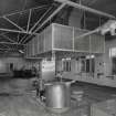 Interiorview of main kitchen showing oven and extraction hood.