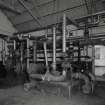 Interior view of boiler house pump room and hot water system.