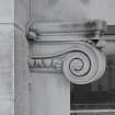 Detail of ionic capital on corner pilaster.