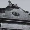 Detail of roofline of E elevation of central block.