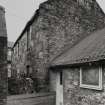 View of outhouses to rear from S.