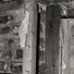 Interior.
Detail of first floor S wall showing sawn timber framing.