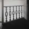 Interior.
Detail of balusters at head of stair in NE angle-tower.