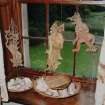 Interior.
View of ornaments in NE staircase first floor window.