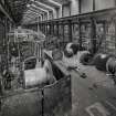 Interior.
View of ropery from ESE (on socket platform built for production of ropes for Tsing -Ma-Lantau road/railway suspension bridge in Hong Kong, due for completion in 1997) of rotating back-stand end of dual-purpose closing/stranding machine (D15).