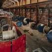 Interior.
View of ropery from ESE (on socket platform built for production of ropes for Tsing -Ma-Lantau road/railway suspension bridge in Hong Kong, due for completion in 1997) of rotating back-stand end of dual-purpose closing/stranding machine (D15).