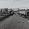 View from SSW along W side of Ropery (right), with former wire-drawing department (left).