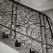 Interior.
Detail of wrought-iron balustrade from the N central stair.