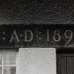 Entrance doorway,  carved "A.D: 1899" date lintel, detail