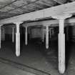 Glasgow, 65-73 James Watt Street, Warehouses, Interior.
General view of fourth floor. North area with fluted cast-iron columns and wooden floors. 
(Columns 0.16m diameter at base and 2.17 high).