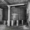 Glasgow, 65-73 James Watt Street, Warehouses.
Detail of large wooden whisky vat in basement. South-West leg from North-East.