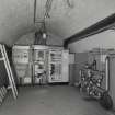 Interior. Basement. View of S wing vaulted store from N showing new electrics