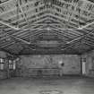 Interior. Top flat, view of E end of mill, showing hipped roof and light wrought-iron roof trusses