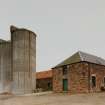 View from NW of 2 concrete silage towers (at NE side of farm)