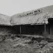 View of cattle court at E side of farm