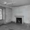 Interior. 
Second Floor East bedroom adjacent to South East bedroom, view from North showing fireplace.