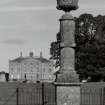 View of monument and house from South