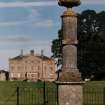 View of monument and house from South