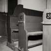 Interior.
Detail of pews.