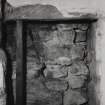 Interior.
Detail of doorway remains exposed in N wall of kitchen, ground floor.