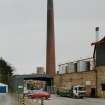 View of Loading Bay, Chimney and Oil Tanks from NW.