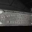 Interior.
Detail of nameplate of hand operated overhead crane in old power station.