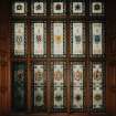 Interior.
Detail of main staircase stained glass window with heraldic shields.