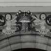 Interior.
Detail of carved coat of arms with figures above balcony of Hopetoun Loft.