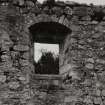 Interior.
View of window embrasure in N wall.