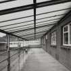 Interior.
View of verandah at SE corner of R4 block.