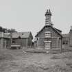 View of cottage and steading from S.