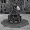 Courtyard, fountain, view from 1st. floor of range to west