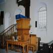 Interior, detail of pulpit and communion table