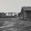 View of farmhouse and steading from SW.