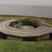 View from W of gun-emplacement showing holdfast and shell loading platform.