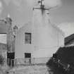 View of house adjacent to number 9 Bridge Street, now demolished, from W.