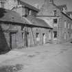 View of number 13 and outbuilding from S.