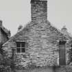 View of former bakehouse from SW.