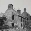 View of 21 and 23 Bridge Street and adjacent buildings, now demolished, from SW.