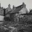 View of 21 and 23 Bridge Street and adjacent buildings, now demolished, from NW.