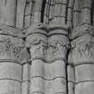 Interior.  Choir, N aisle, detail of carved capital
