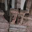 Interior.  Nave, N aisle, detail of corbel carved in the shape of a head