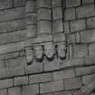 Interior.  Choir, detail of head shaped corbels at upper level