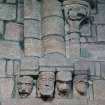 Interior.  Choir, detail of head shaped corbels at upper level