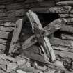 Detail of wooden pulley and lever at S side of base of wind-engine tower