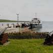 View from the West of the jetty with ferry in Balfour harbour