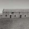 View of threshing barn from S